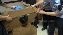 Chinese firemen rescue boy who got his head stuck in massage chair