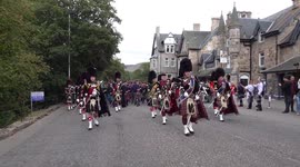 Massed pipes & drums parade to the 2018 Braemar Gathering Royal Highland Games in Scotland (4K)