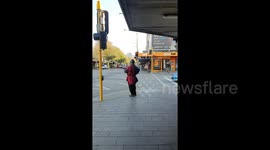 New Zealand man captures moment 4 people partake in sword fight on a road
