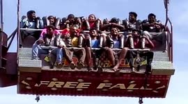 Horrific moment amusement park ride with a dozen people on board, develops snag and plummets to the ground in southern India
