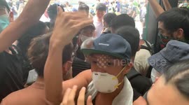 Old man quarrels with protesters inside Hong Kong's Immigration Tower