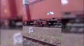 Woman escapes unhurt after goods train passes over her in Western India