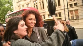 Zendaya returns to hotel and signs for fans as promised