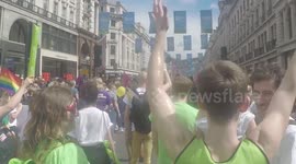 Members of children's charity Barnardo’s march down Regent Street for London Pride Parade