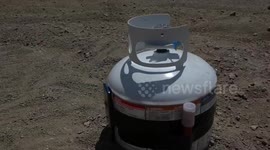 iPhone XS inside a filled propane tank: will it survive?