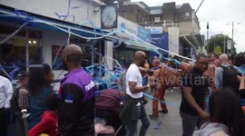 Performers wielding giant paper tissue guns completely cover London bar