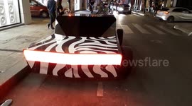 Futuristic wooden car by CandyLab for YSL (Yves Saint Laurent)  spotted in Paris. 23 june 2019.