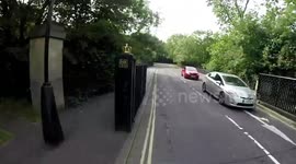 BMW diver runs stop sign and almost hits bike rider / cyclist at Regents Park