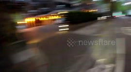 Cyclist bike rider gets angry almost hit by pipe on roof of car