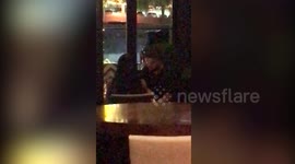Drake spotted with a mystery woman at a steak house in Texas