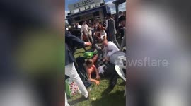 Huge brawl at Royal Ascot sees large group of men punch and kick each other