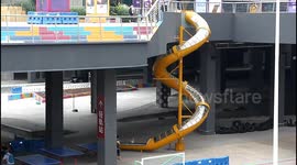 32-foot-high spiral slide has been built at Chongqing train station