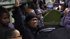 South African Transport Minister takes train ride through Cape Town's townships