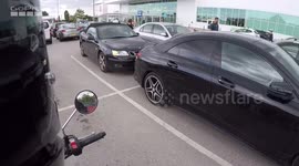 Car rear ends another parked car in Asda