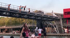 Parisians dive into canal to stay cool during heatwave