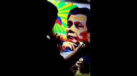 Artist creates recycled straw mural of Philippines president