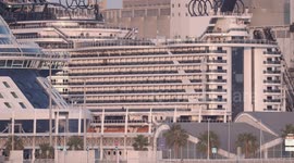 The large cruise ship MSC Seaview arriving into Barcelona port at sunrise