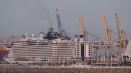 The large cruise ship MSC Seaview arriving into Barcelona port at sunrise