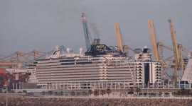 The large cruise ship MSC Seaview arriving into Barcelona port at sunrise