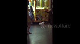 Little girl gets stuck inside claw machine 'looking for a teddy to gift her friend' in Greece's Rhodes island