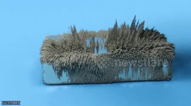 Experiment shows the strength of a magnet attracting iron