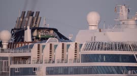 The large cruise ship MSC Seaview arriving into Barcelona port at sunrise