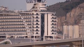 The large cruise ship MSC Seaview arriving into Barcelona port at sunrise