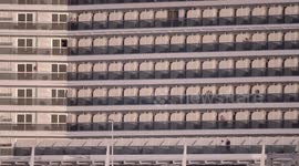 The large cruise ship MSC Seaview arriving into Barcelona port at sunrise