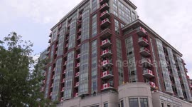 Hundreds of Canadian flags on Burlington seniors residence building to celebrate the Canada day long weekend