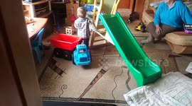 2 Years old Toddler finds his own way to use slide