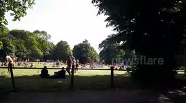 Scores of Londoners enjoy the heat at Clapham Common