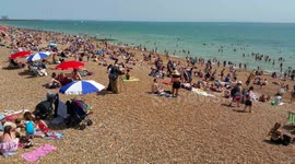 Busy Beach scene during Heatwave in Brighton