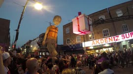Giant Puppet Takes A Walk Down Roman Road