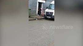 Sickening moment a butcher is caught blow-torching meat on UK street