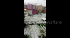 Severe hailstorm turns road into icy river in Mexico state