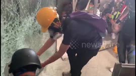 Hong Kong protesters smash windows and try to storm government headquarters
