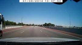 Rake falls from truck at 100km/h