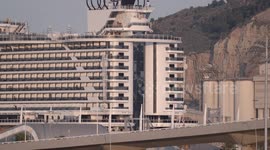 The large cruise ship MSC Seaview arriving into Barcelona port at sunrise