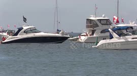 Canada Day: Boats out on Lake Erie at Port Dover and people enjoying the sunny warm summer weather over long holiday weekend