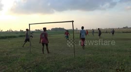Unique football in the middle of cornfield without counting the number of players, without using shoes and someone using a sarong, the number of players depends on how many are participating, this video was shot using Sony cameras, on June 30 2019, in Ked