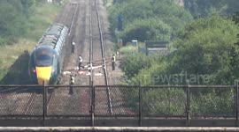 Police and forensics investigate fatal train collision that left 2 dead in Wales