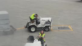 Canada airport worker caught napping on vehicle as numerous planes go past