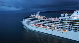 Beautiful Drone Footage Of Cruise Ship Lit Up In Summer Twilight