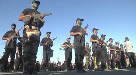 Young Palestinians take part in a military-style exercises at summer camp organised by the Islamic Jihad movement
