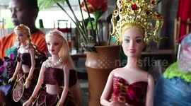 Remote village dressmakers flooded with orders for Thai silk Barbie doll costumes
