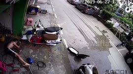 Chinese man suffers lengthy electric shock after being unable to let go of car wash pump