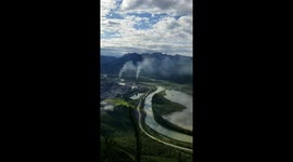 A factory spewing pollution into the air - Bow Valley and Banff National Park