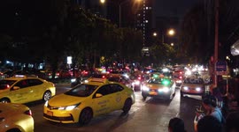 Taxis queue across five lans outside Thai night market