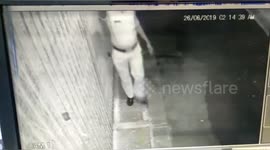 Captured in CCTV a poilce stealing LED / CFL bulb  in Northern India.