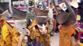 Locals wear ghost masks at spirit worship festival in Thailand